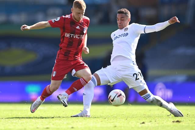 ON THE BENCH: Leeds United's record signing Rodrigo, pictured challenging Fulham's Harrison Reed in last weekend's clash against the Cottagers. Photo by Laurence Griffiths/Getty Images.