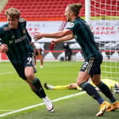 THREE IN THREE: Leeds United striker Patrick Bamford wheels away to celebrate with Luke Ayling as Sheffield United 'keeper Aaron Ramsdale, background, is finally beaten at Bramall Lane. Photo by Alex Livesey/Getty Images.