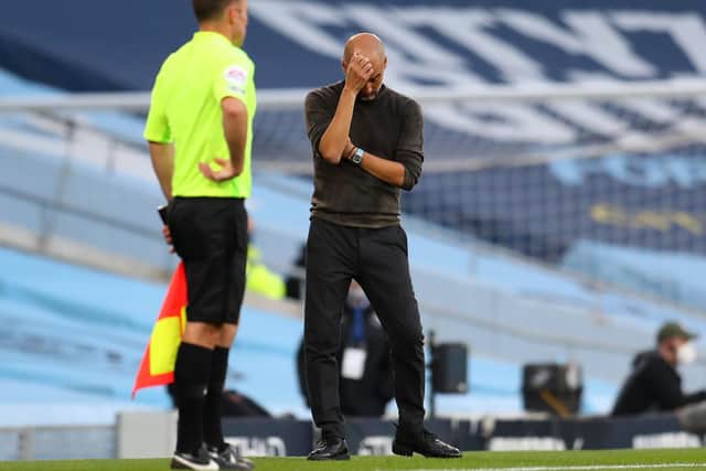 TROUBLES: For Manchester City boss Pep Guardiola. pictured above, during Sunday's 5-2 loss at home to Leicester City. Photo by Catherine Ivill/Getty Images.