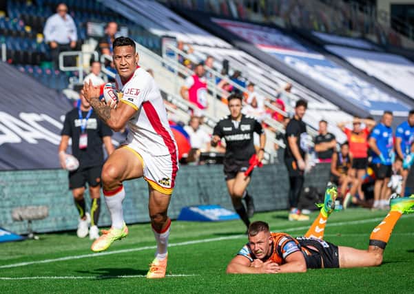 Catalans' Israel Folau runs in for a try against Castleford last month at Emerald Headingley, where he will line up to face Leeds Rhinos on Wednesday. Picture by Alex Whitehead/SWpix.com