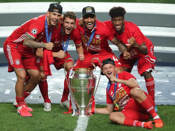 YOUNG GUN - Michael Cuisance, bottom right with Bayern Munich's Champions League troph, is being sold to Leeds United. Pic: Getty