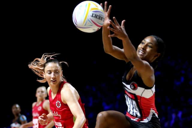 England's Jade Clarke (left) and Trinidad and Tobago's Shantel Seemungal in action during the Netball World Cup match at the M&S Bank Arena, Liverpool in 2019 (Picture: Nigel French/PA Wire)