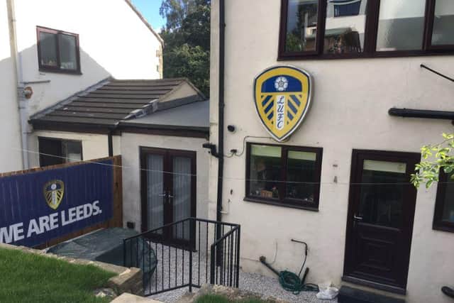 The Leeds United badge from Elland Road at Ben Hunt's home.