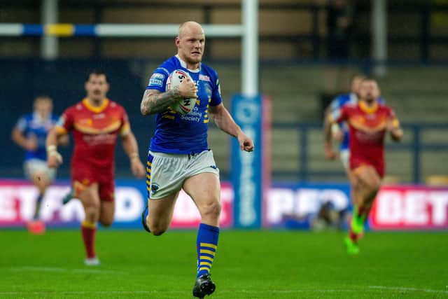 Rhys Evans runs in to score for Leeds Rhinos against Catalans Dragons
. Picture: Bruce Rollinson.