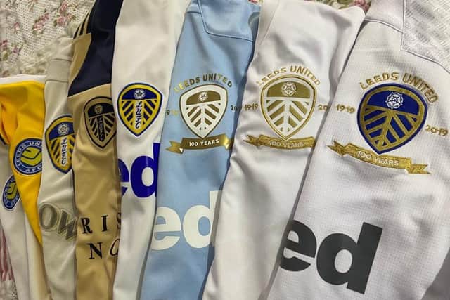 Leeds United Brazil supporter Tassio's collection of shirts.