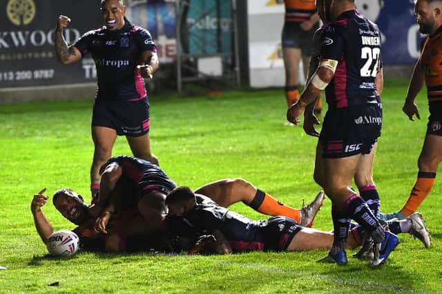 Pile on: Castleford's Mike McMeeken scores his second try against Hull.
Picture: Jonathan Gawthorpe