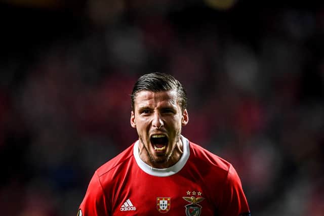 EXPENSIVE RECRUIT: Portugal international defender Ruben Dias celebrates scoring for former club Benfica in a Europa League clash against Shakhtar Donetsk last February. Photo by PATRICIA DE MELO MOREIRA/AFP via Getty Images.