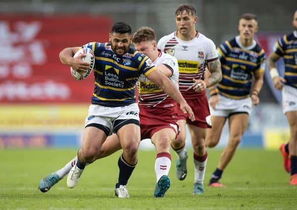 Rhyse Martin of Leeds is tackled by Morgan Smithies of Wigan during the Super League meeting between the two sides back in August. Picture: Isabel Pearce/SWpix.com