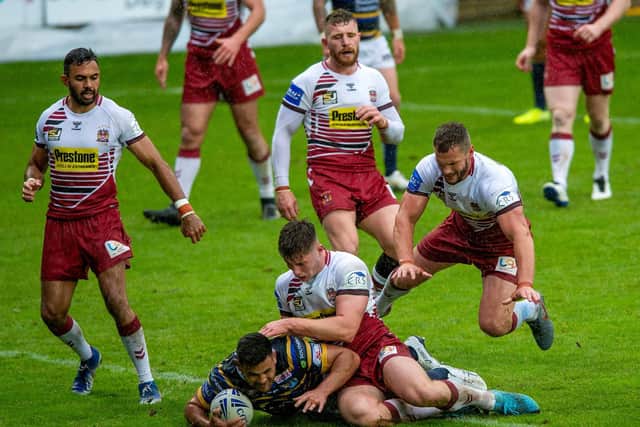 Rhyse Martin scores Rhinos opening try. Picture by Bruce Rollinson.