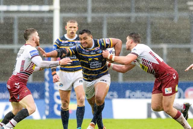 Ava Seumanufagai powers through the St Helens rain and Wigan defence. Picture by Bruce Rollinson.