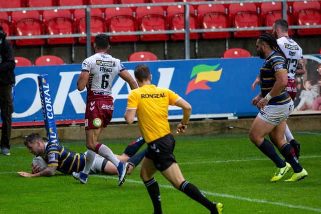 Tom Briscope scores Rhinos' third try. Picture by Bruce Rollinson.