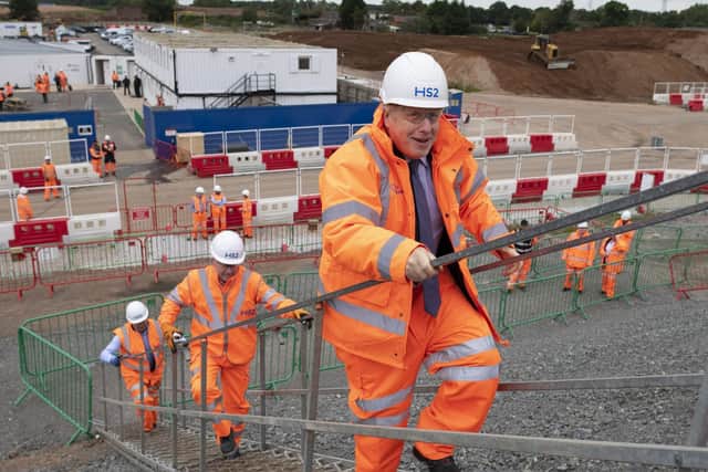 Prime Minister Boris Johnson during a visit to the HS2 Solihull Interchange building site in the West Midlands to mark the formal start of construction on HS2, in September 2020. Photo credit: PA