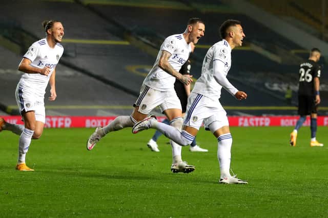 OFF THE MARK: Leeds United's record signing Rodrigo races off to celebrate after putting the Whites all square against Manchester City. Photo by Catherine Ivill/Getty Images.