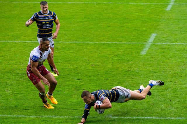 Ash Handley dives over for the first of his two tries against Wigan. Picture by Bruce Rollinson.
