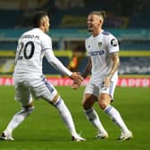 BACK ON TERMS: Kalvin Phillips, right, celebrates with Whites goalscorer Rodrigo after Leeds United draw level with Manchester City. Photo by Catherine Ivill/Getty Images.