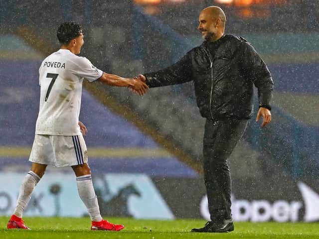 TOUGH GAME - Ian Poveda shaking the hand of former manager Pep Guardiola after starring in Leeds United's 1-1 draw with Manchester City. Pic: Getty