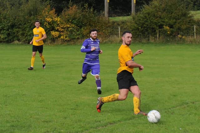 Sam Simkins scores for North Leodis beating Amaranth 12-0 in Division 4 of the Leeds Combination League. Picture: Steve Riding.