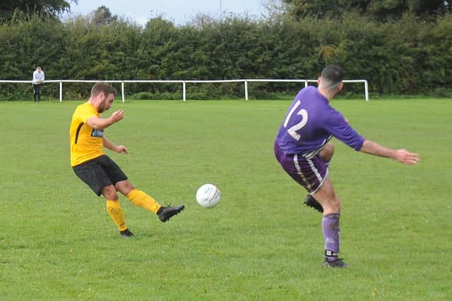 Matty Johnson scores the 12th goal for North Leodis beating Amaranth in Division 4 of the Leeds Combination League. Pictures: Steve Riding.