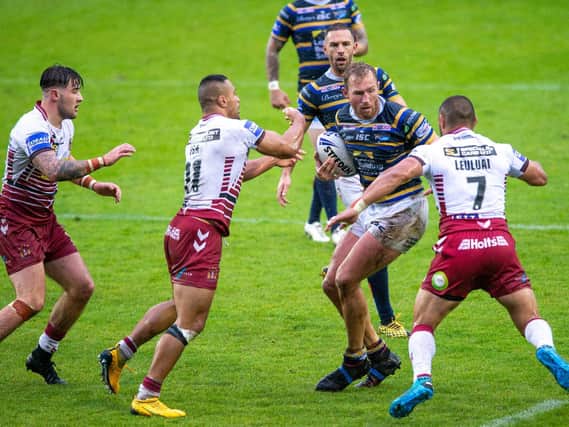 Rhinos' Matt Prior is closed down by the Wigan defence during the semi-final. Picture by Bruce Rollinson.