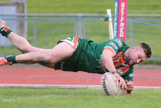 AJ Boardman scores the winning try for Hunslet against North Wales Crusaders in February.