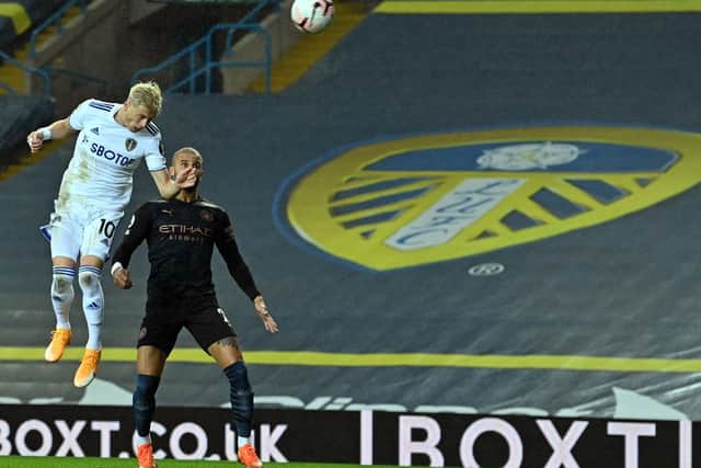 'WEIRDEST GAME': Manchester City defender Kyle Walker sees Leeds United's Gjanni Alioski put a free header over the bar in Saturday evening's 1-1 draw at Elland Road. Photo by PAUL ELLIS/POOL/AFP via Getty Images.
