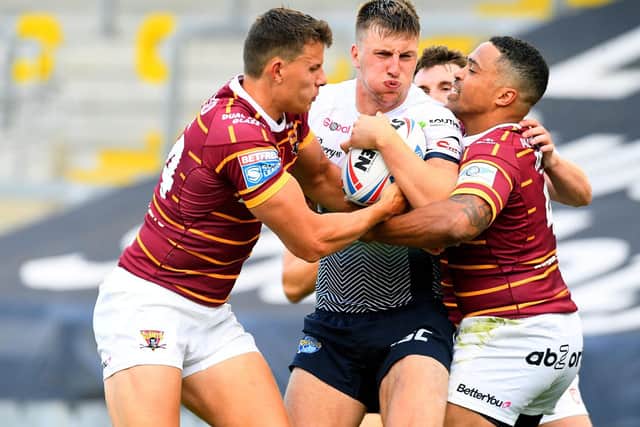 Alex Mellor in possession against his former club Huddersfield Giants. Picture by James Hardisty.