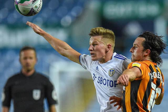 LOAN MOVE: For Leeds United's Polish midfielder Mateusz Bogusz, right. Photo by OLI SCARFF/POOL/AFP via Getty Images.