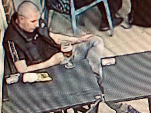 British Transport Police want to speak to this man in connection with an alleged racist assault in Leeds Station.