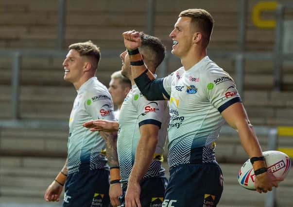 Three-mendous: Winger Ash Handley scored a hat-trick in Leeds' win over Hull FC.  Picture Bruce Rollinson
