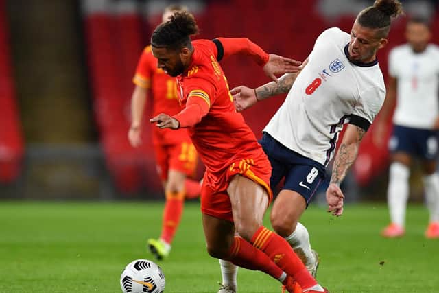 FRIENDLY FIRE - Kalvin Phillips fouling Leeds United team-mate Tyler Roberts in England's friendly win over Wales. Pic: Getty
