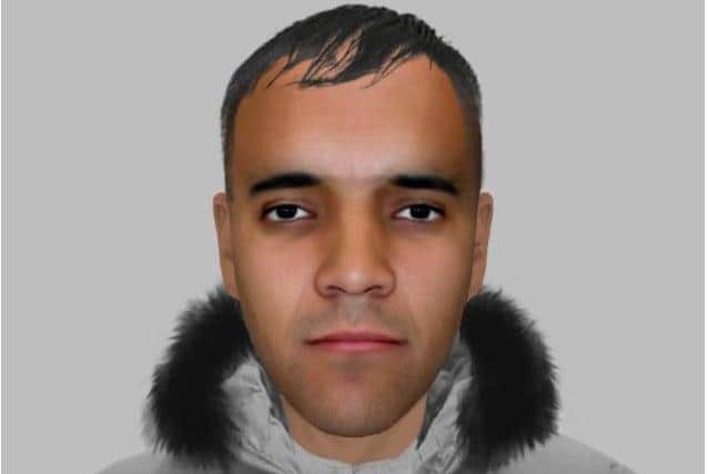 An E-fit appeal of a man police want to speak to after a woman was approached in a park by a man committing a sex act.