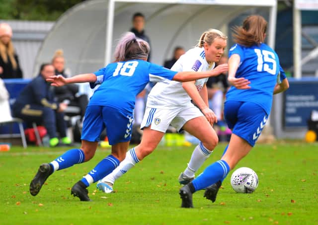 Leeds United Women's Rebecca Hunt takes on Dannika Purdham and Grace Ayre of Durham. Picture: Steve Riding.