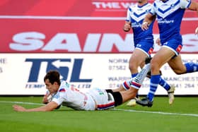 Alex Walkers scores Trinity's first try. Picture by Bruce Rollinson.