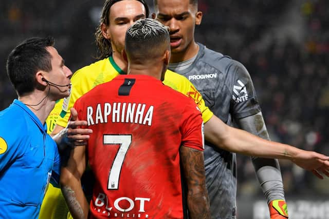 SMALL WORLD: Nantes goalkeeper Alban Lafont argues with new Leeds United recruit Raphinha during January's derby match against Rennes. Photo by DAMIEN MEYER/AFP via Getty Images.