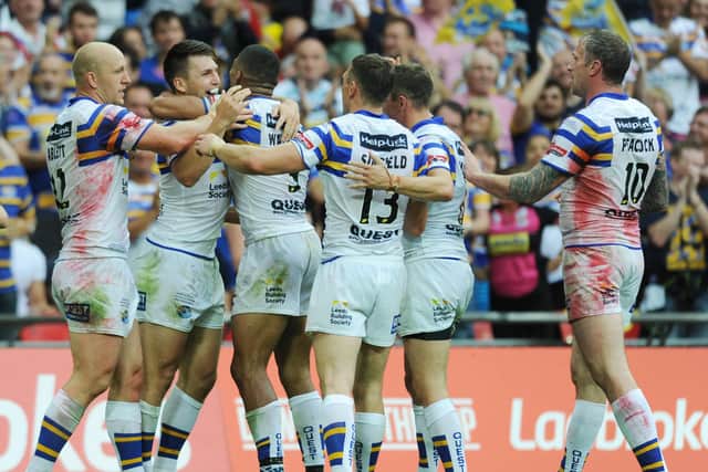 FLASHBACK: 
Tom Briscoe celebrates the third of his five tries against Hull KR - the last time Leeds Rhinos played at Wembley in the 2015 Challenge Cup final. Picture: Steve Riding.