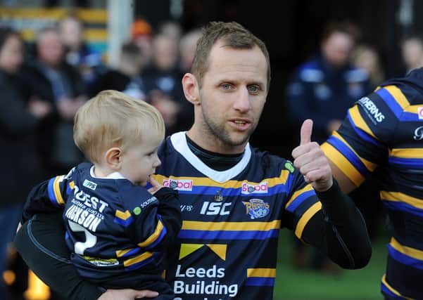 Rob Burrow with his son, Jackson. Picture: Steve Riding.