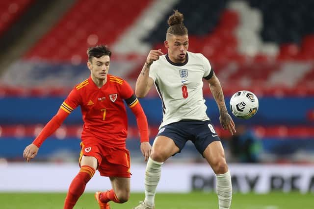 SETTLING IN: Leeds United midfielder Kalvin Phillips keeps ahead of Dylan Levitt during Thursday evening's friendly against Wales at Wembley in just his second appearance for the Three Lions. Photo by Carl Recine - Pool/Getty Images.