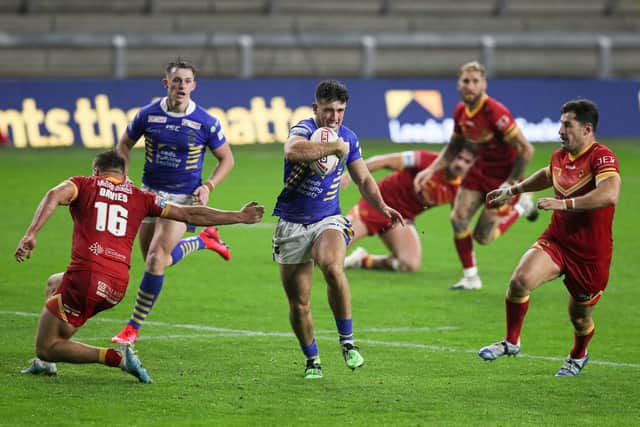 Leeds Rhinos' Liam Tindall runs through the Catalans Dragons' defence. Picture: Paul Currie/SWpix.com.