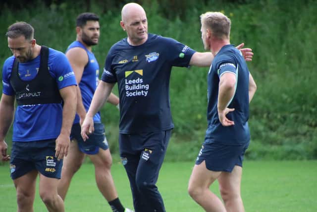 Leeds Rhinos head coach Richard Agar with Brad dwyer in training. Picture: Varley Picture Agency.