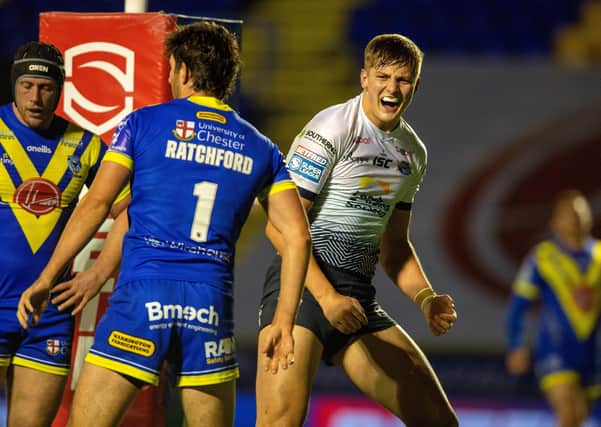 Magic moment: Young forward Sam Walters celebrates after scoring Rhinos' first try.
 Picture Bruce Rollinson