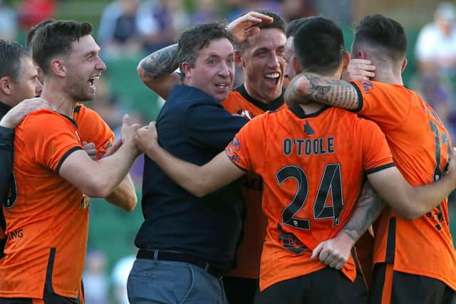 SUCCESS: Brisbane Roar went from second-bottom to fourth under former Leeds United striker Robbie Fowler, centre. Photo by Paul Kane/Getty Images.