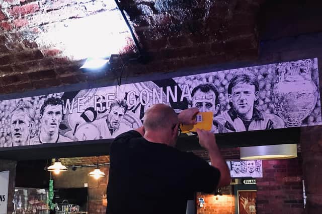 Artist Carl Knapper and designer Chris Pitts have created the Leeds United themed artworks.
