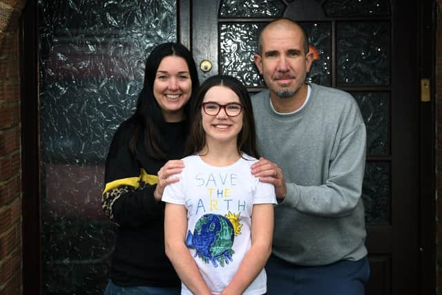 Cliamte change campaigner Esther Adamson pictured with parents Amanda and Richard.