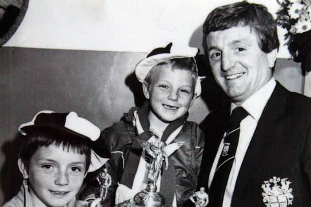 A young Richard Agar, left, his brother Jonathan and their dad Allan with the Challenge Cup at Wembley in 1983. Picture by YPN.