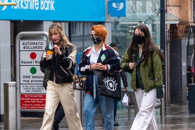 Pictured: Masked shoppers head down Briggate as Tier 2 rules come in. The restrictions have been confusing in Leeds, according to senior Conservatives.