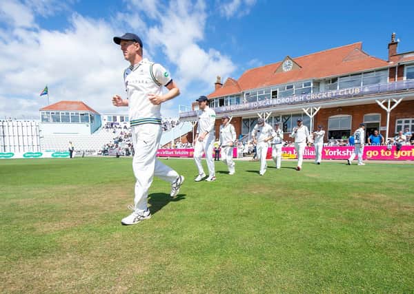 New deal: Yorkshire's Steve Patterson leads his side out against Surrey at Scarborough. Picture: SWPix