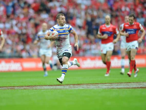 Rob Burrow scores in Leeds' 2015 Cup final win over Hull KR. Picture by Steve Riding.