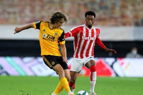 RECORD-BREAKER: Wolves teen Fabio Silva, left, pictured on his debut for his new club in last month's Carabao Cup clash against Stoke City at Molineux. Photo by Catherine Ivill/Getty Images.