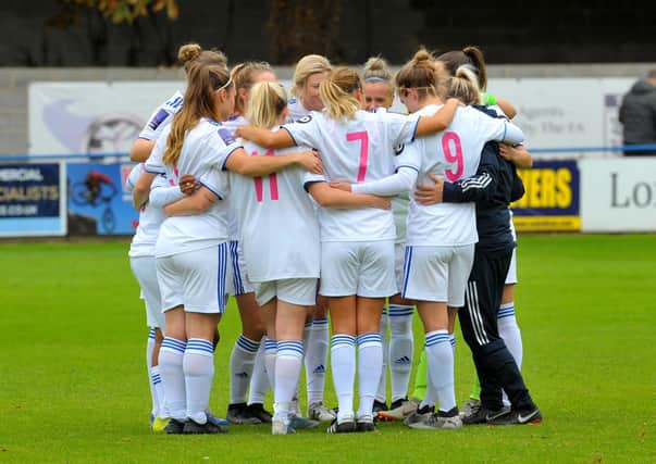Skye Kirkham and her Leeds United Women team-mates in a huddle before their recent match with Durham Cestria. Picture: Steve Riding.