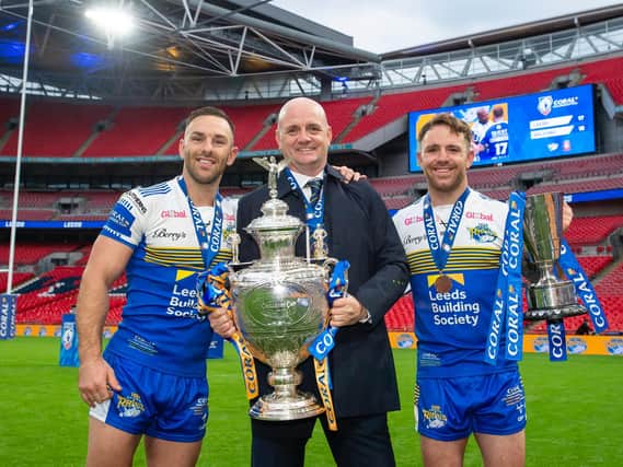 Luke Gale, Richard Agar and Richie Myler with the Challenge Cup trophy. Picture: Allan McKenzie\SWpix.com.
